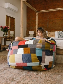 Lady sitting on colourful bean bag