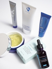 Selection of skincare beauty products from SkinMiles on a white backdrop