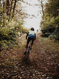 A cyclist on a trail